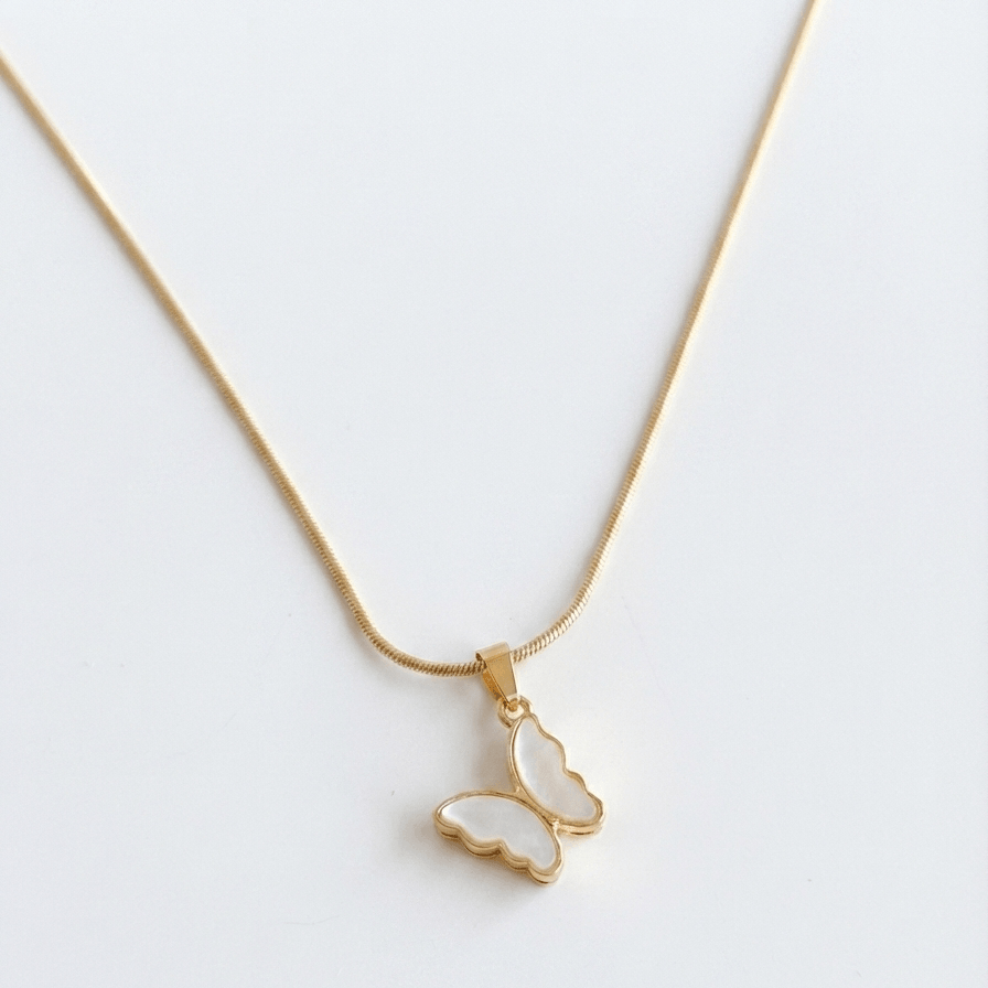 Anti-tarnish gold chain necklace featuring a butterfly pendant with a white inlay