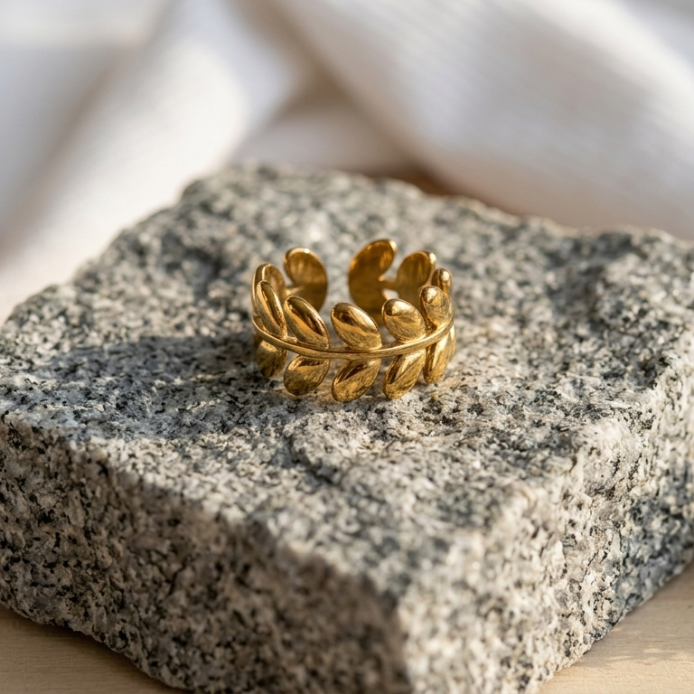 Gold Leaf Wheat Band Ring placed