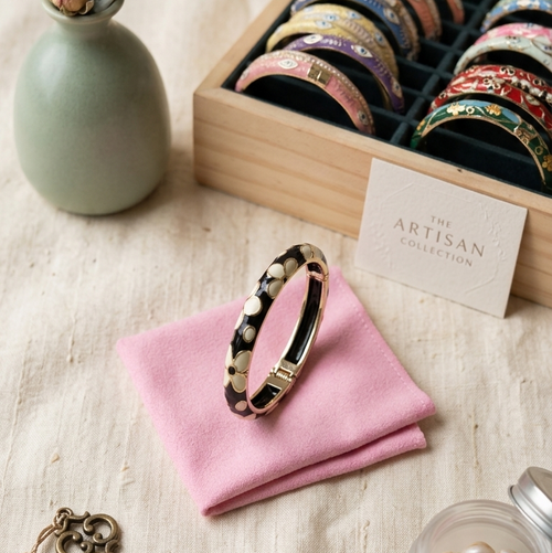 Collection of colorful Meenakari kada bracelets.